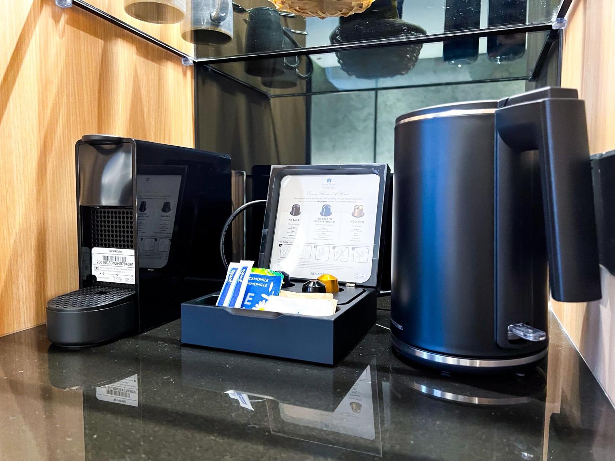 Hotel Royal Signature 吉隆坡 外观 照片 A Nespresso coffee machine in a hotel room