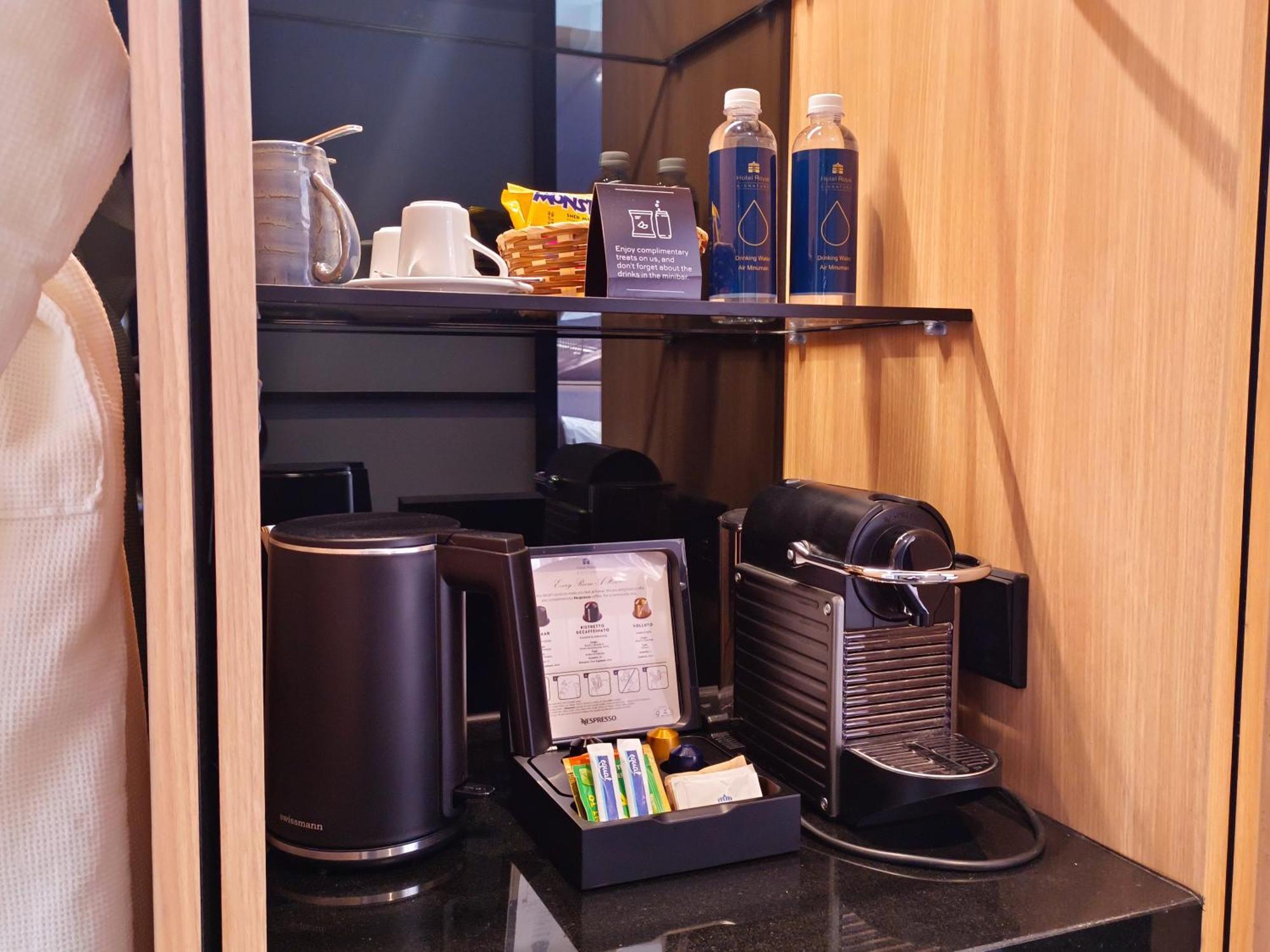 Hotel Royal Signature 吉隆坡 外观 照片 A Nespresso coffee machine in a hotel room